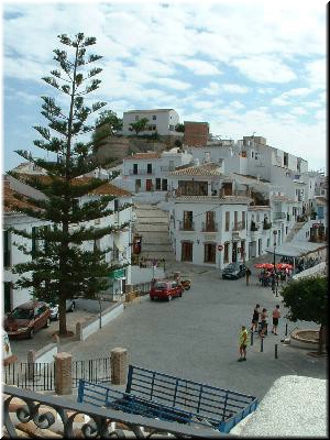 Main square, where the weekly market takes place. New village in background.