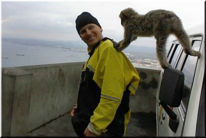 This guy should watch his pockets. One monkey tried to steal Amber's backpack right off her back!